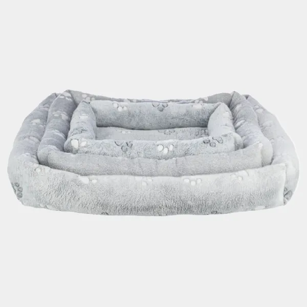 Cama acolchada de terciopelo gris para perros con bordes elevados y patrones de huellas, diseño confortable y elegante para el descanso de tu mascota
