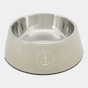 Cuenco de comida para perros color arena con detalle de ancla, antideslizante y de acero inoxidable, ideal para razas pequeñas y medianas.