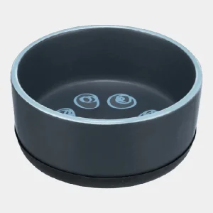 Comedero de cerámica para mascotas en tono gris oscuro con detalles de huellas en azul claro, proporcionando una solución de alimentación elegante y resistente para tu compañero fiel
