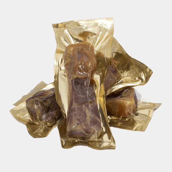 Huesitos para perros envueltos individualmente, de jamón serrano natural, listos para ayudar a tu mascota a mantener una dentadura fuerte y libre de sarro