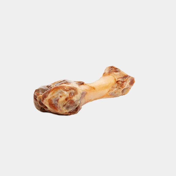 Hueso de jamón serrano para perros, un snack natural y duradero que ayuda a la limpieza dental y mejora la salud general del canino