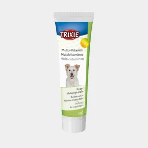 ubo de multivitamínico para perros marca Trixie con vitaminas esenciales para refuerzo del sistema inmunológico y aumento de energía en mascotas, presentado en un envase blanco con detalles verdes y la imagen de un perro sonriente
