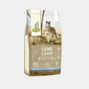 Paquete de croquetas de cordero para perros Adult Steppenwolf con berries y hierbas silvestres, mostrando un 92% de ingredientes de origen animal y 8% de vegetales, libre de cereales