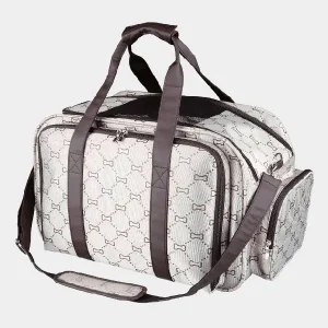 Bolsa transportadora de perro ligera y estampada con huesos, equipada con múltiples correas para un transporte versátil y paneles de malla para una ventilación óptima