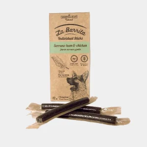 Barritas para perros de jamón serrano y pollo en envase ecológico, mostrando un 70% de contenido en carne fresca y omega 3 y 6