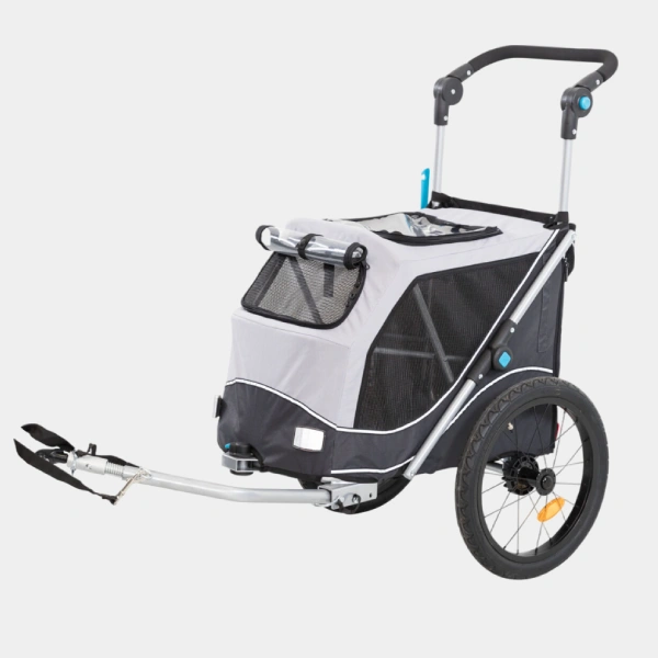 Remolque de bicicleta para perros de color gris y negro con malla transpirable y sistema de enganche seguro, ideal para paseos al aire libre