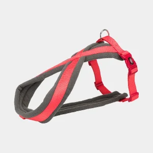 Arnés ajustable para perros en color coral con acolchado de felpa suave y correas planas ajustables.